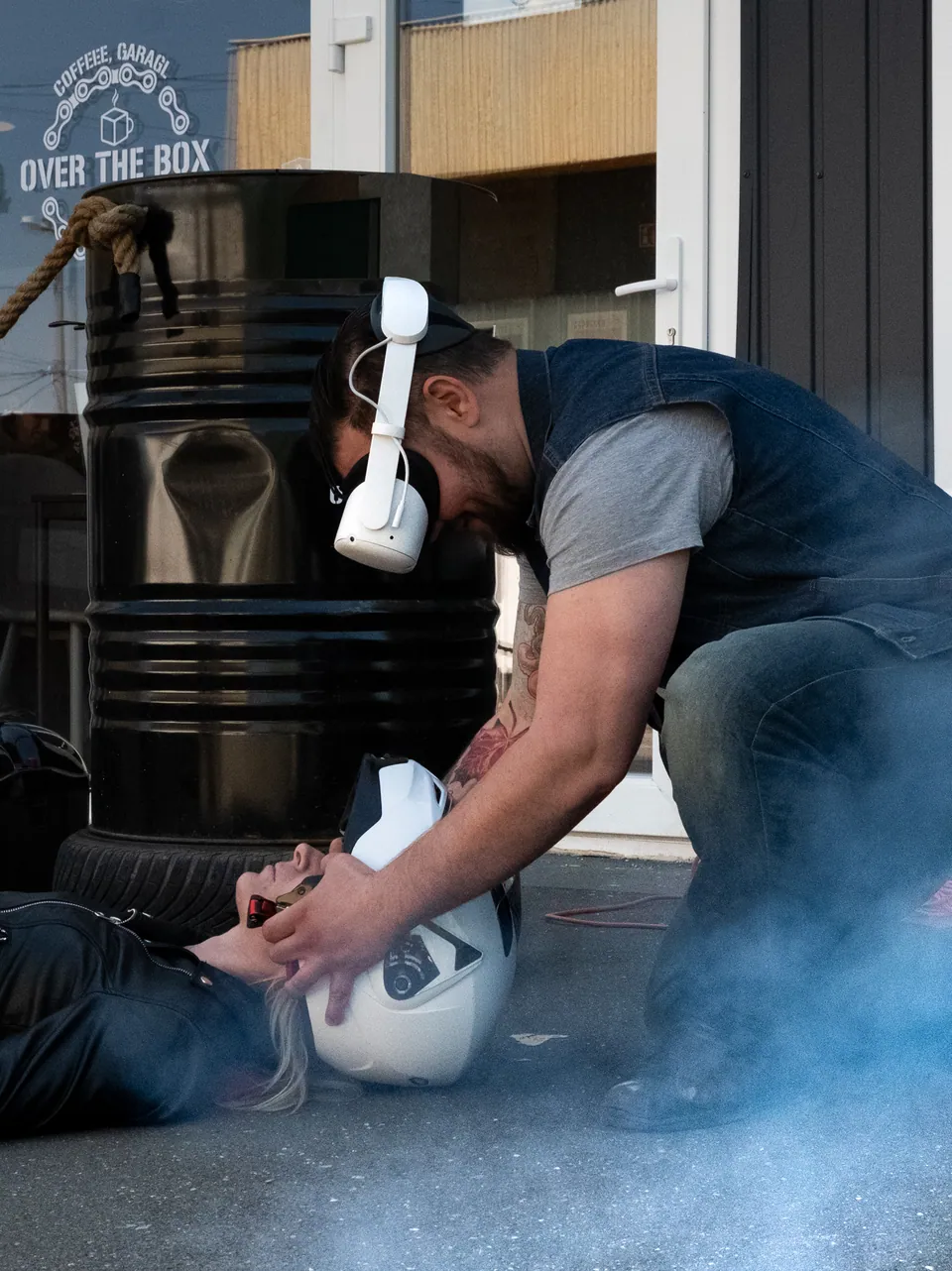 A staged first-aid scene during the shared campaign shoot